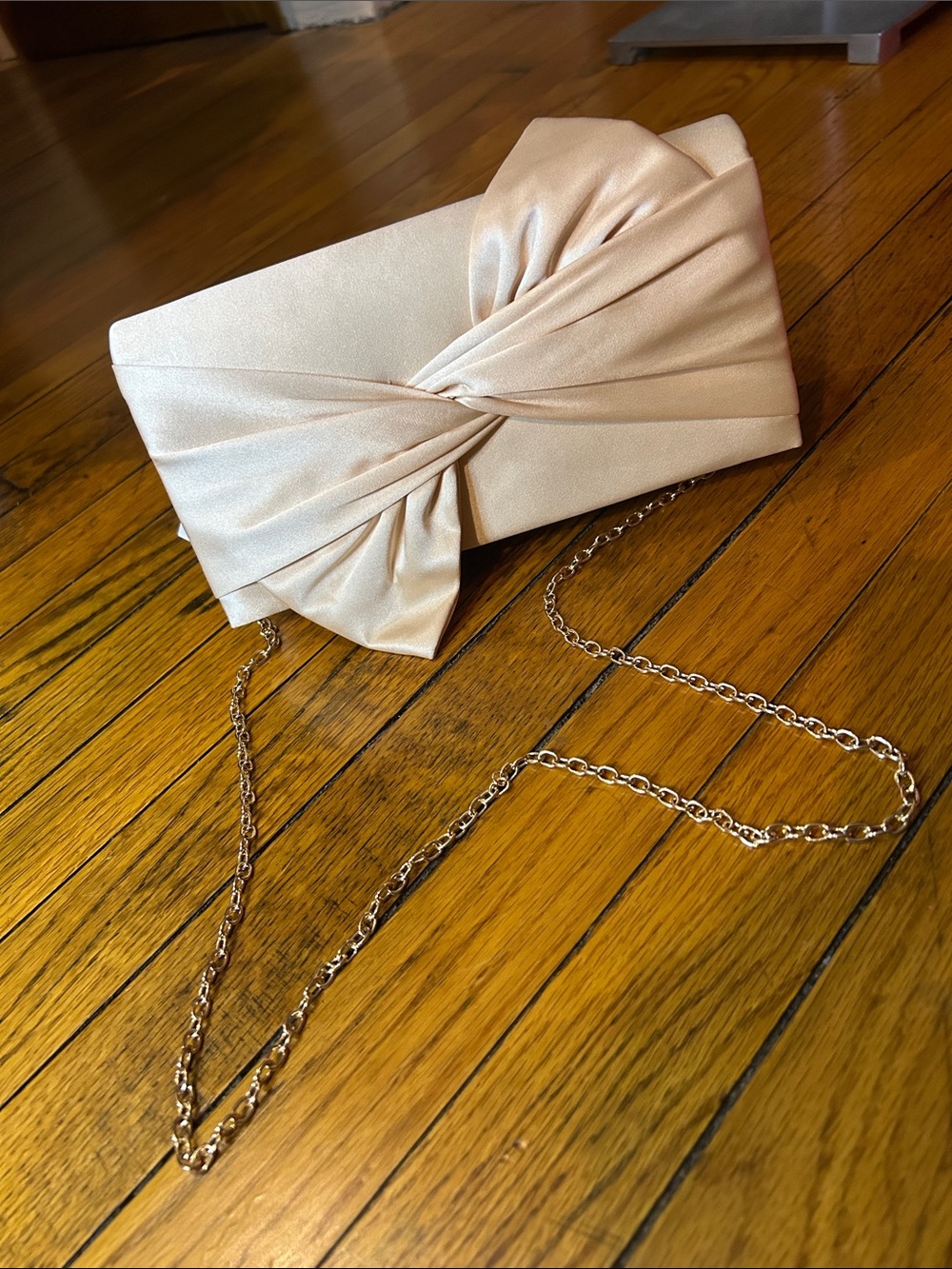 AKIRA Satin Twist Knot Clutch in Champagne Beige with Gold Chain